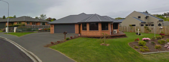 Police and Private investigators and police swooped on this house at 13 Duxford Crescent, Fairfield, Otago, New Zealnd on September 1, 2006.